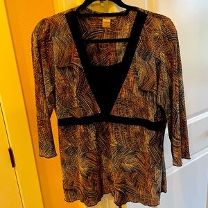 Dressbarn Women’s L in black, rust, browns, and cream in a beautiful pattern.